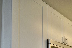 Kitchen with Wood Inspired Floor, Oven, and Stove